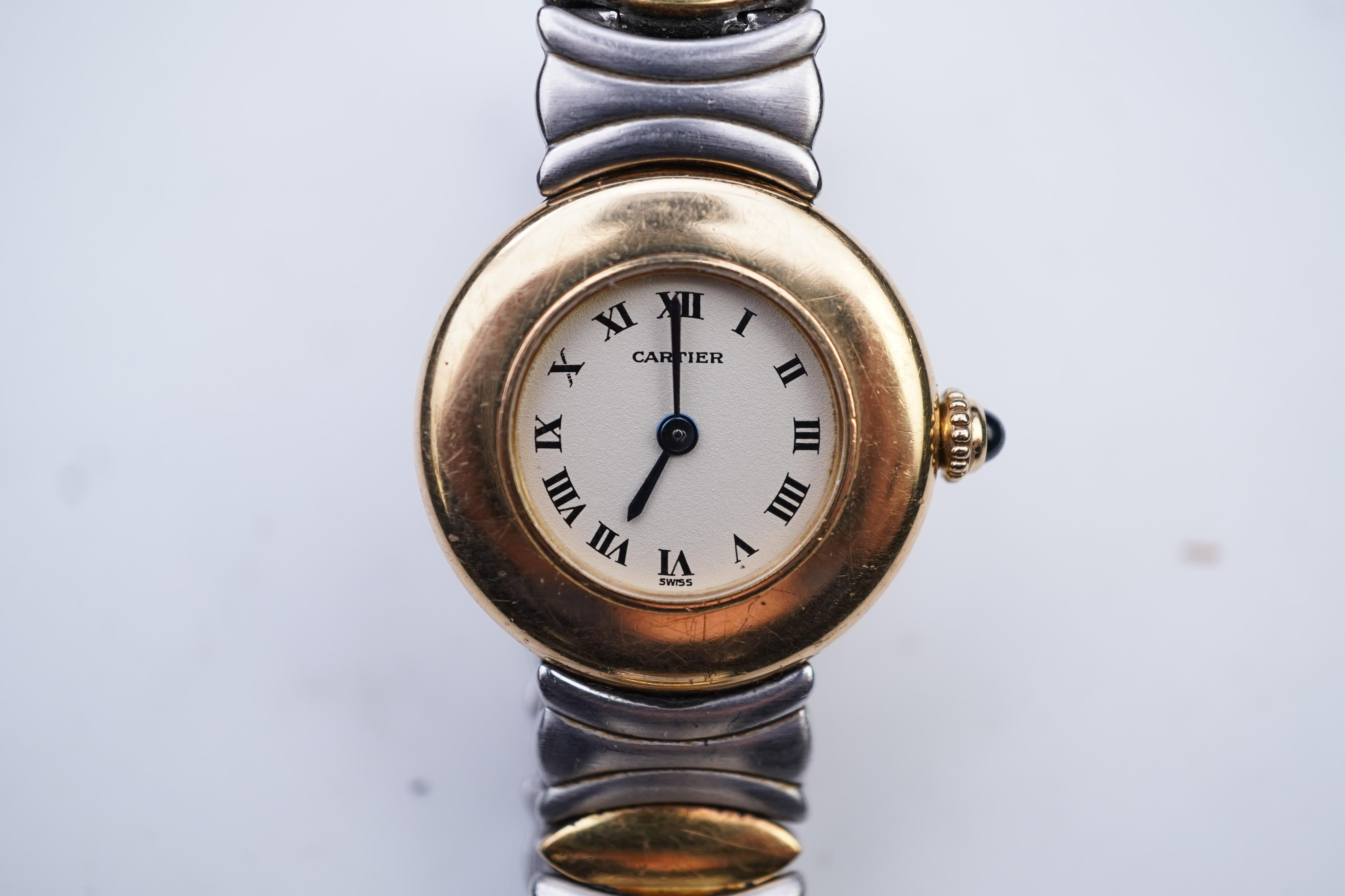 Cartier, a lady's gold and stainless steel wristwatch, 'Colisée', ref.8057908C